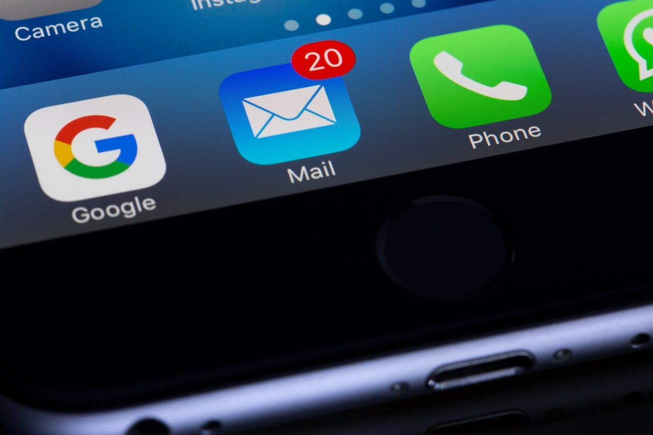 Smartphone screen showing email app with unread notifications